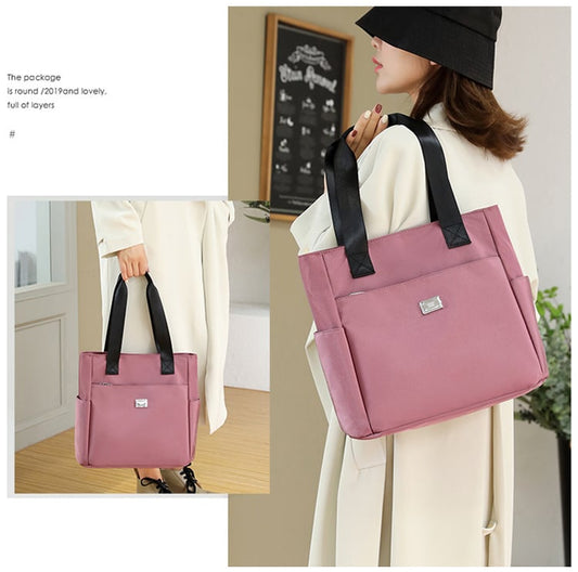 2026 Nagy kapacitású, vízálló, több zsebbel ellátott nylon válltáska